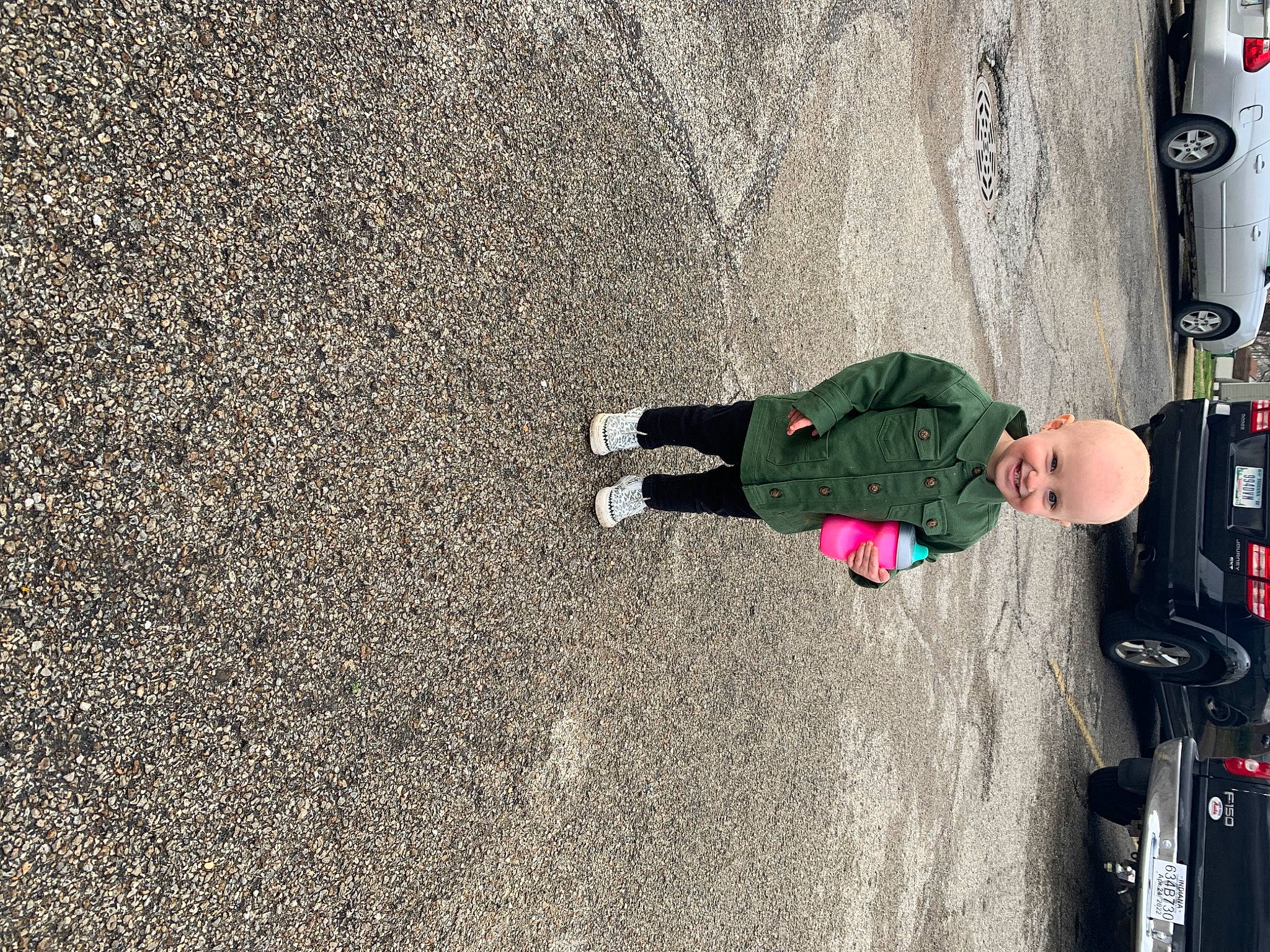 Evelynn joined the competition — help win amazing prizes! asphalt, automotive_lighting, automotive_tire, car, concrete, joy, motor_vehicle, person, recreation, road, road_surface, rolling, sidewalk, standing, tar, tints_and_shades, tire, toddler, vehicle, walking_shoe