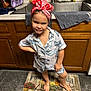 Phoenix joined the competition — help win amazing prizes! child, girl, pajamas, headwrap, kitchen, sink, cabinet, mat, pumpkin, barefoot, standing, expression, playful, indoor, wood, towel, countertop, floor, cute, smirk