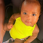 Amora joined the competition — help win amazing prizes! baby, child, yellow_clothing, yellow_bow, car_seat, infant, cute, portrait, skin, eyes, hair, sitting, person, one_person, indoors, seatbelt, foot, hand, looking_up, adorable