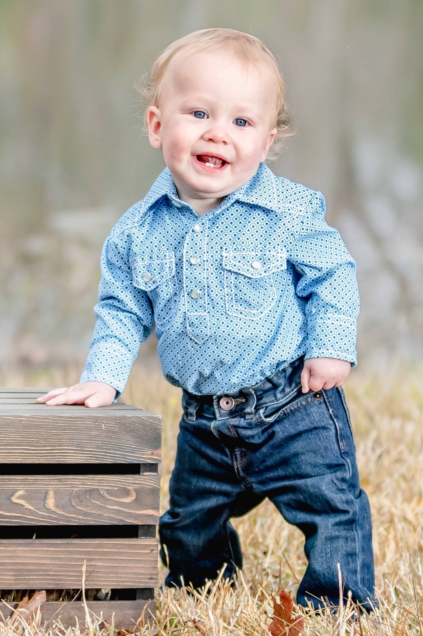 Conner is registered to the contest to win money with this photo: baby_toddler_clothing, clothing, collar, dress_shirt, eye, face, facial_expression, happy, head, human_body, jeans, joy, outerwear, people_in_nature, person, plant, shirt, skin, sleeve, smile