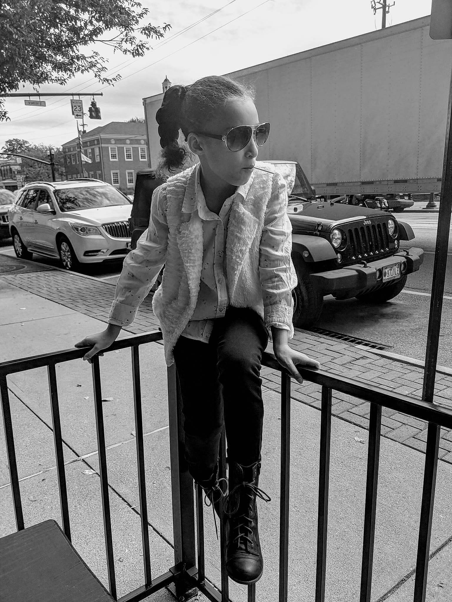 Laylah joined the competition — help win amazing prizes! automotive_design, black, black_and_white, car, eyewear, fashion, fence, glasses, goggles, infrastructure, land_vehicle, leg, person, street_fashion, style, sunglasses, tire, vehicle, vision_care, wheel