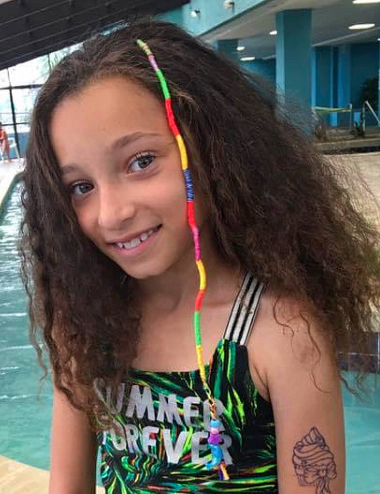 Laylah joined the competition — help win amazing prizes! beauty, black_hair, chest, cool, eyebrow, eyelash, fashion, green, hairstyle, happy, joy, long_hair, muscle, person, shoulder, skin, sleeveless_shirt, smile, summer, thigh