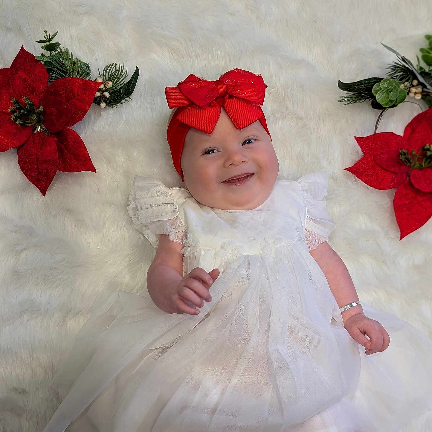 Adalyn joined the competition — help win amazing prizes! accessories, baby, bodypart, clothing, dress, face, finger, flower, flowerarrangement, flowerbouquet, formalwear, hand, hat, head, leaf, person, petal, photography, plant, portrait