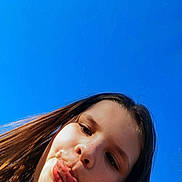 Madalyn Penn joined the competition — help win amazing prizes! child, face, tongue, sky, blue_sky, hair, outdoor, playful, expression, person, young, freckles, nature, casual, daylight, portrait, fun, closeup, youth, happy