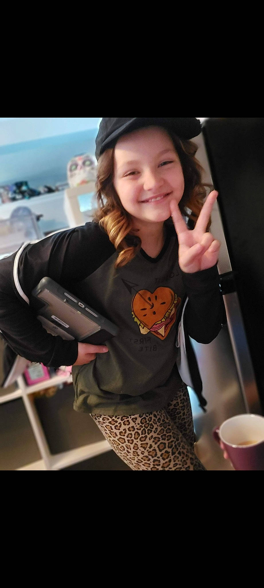 Sienna is registered to the contest to win money with this photo: automotive_design, cool, cup, eyewear, fashion_accessory, fun, happy, human_leg, joy, leggings, long_hair, pattern, person, personal_protective_equipment, selfie, sleeve, smile, sportswear, steering_wheel, t_shirt