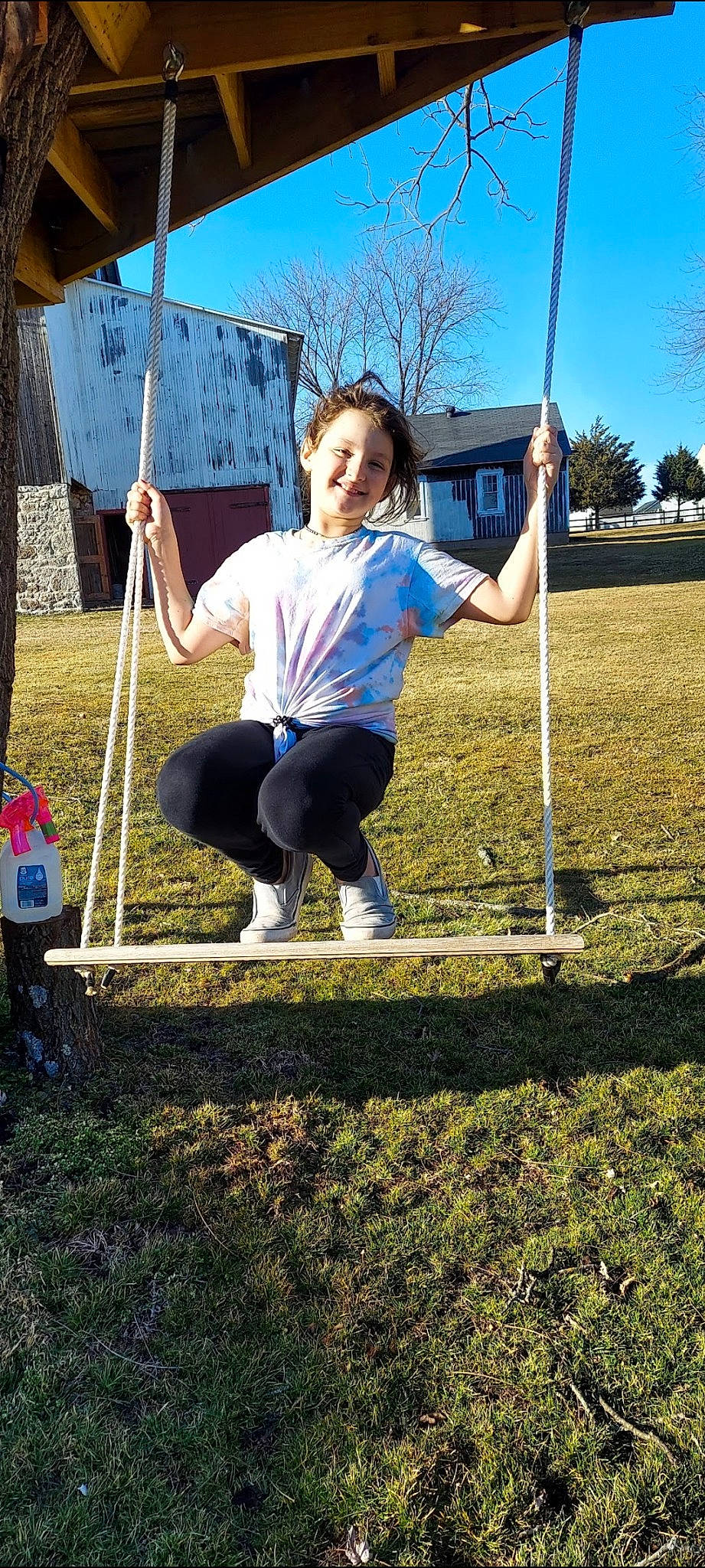 Sienna joined the competition — help win amazing prizes! balance, city, electric_blue, fun, grass, grassland, joy, leisure, outdoor_play_equipment, person, plant, playground, pole, recreation, rope, shorts, sky, smile, swing, t_shirt