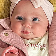 Elia participe au concours pour gagner de l'argent avec cette photo : baby, infant, pink_bow, pink_jacket, yellow_blanket, closeup, portrait, cute, child, headband, clothing, face, hand, skin, expression, smile, indoors, person, newborn, fashion