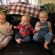 Weston joined the competition — help win amazing prizes! child, toddler, smiling, couch, blanket, indoor, clothing, denim, plaid, barefoot, happy, portrait, person, sitting, holding_hands, family, cute, baby, cozy, home
