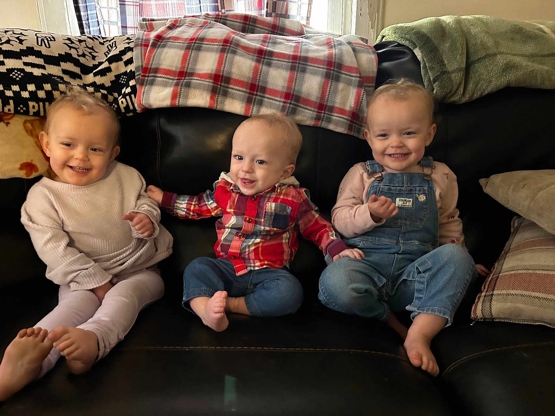 Weston joined the competition — help win amazing prizes! child, toddler, smiling, couch, blanket, indoor, clothing, denim, plaid, barefoot, happy, portrait, person, sitting, holding_hands, family, cute, baby, cozy, home