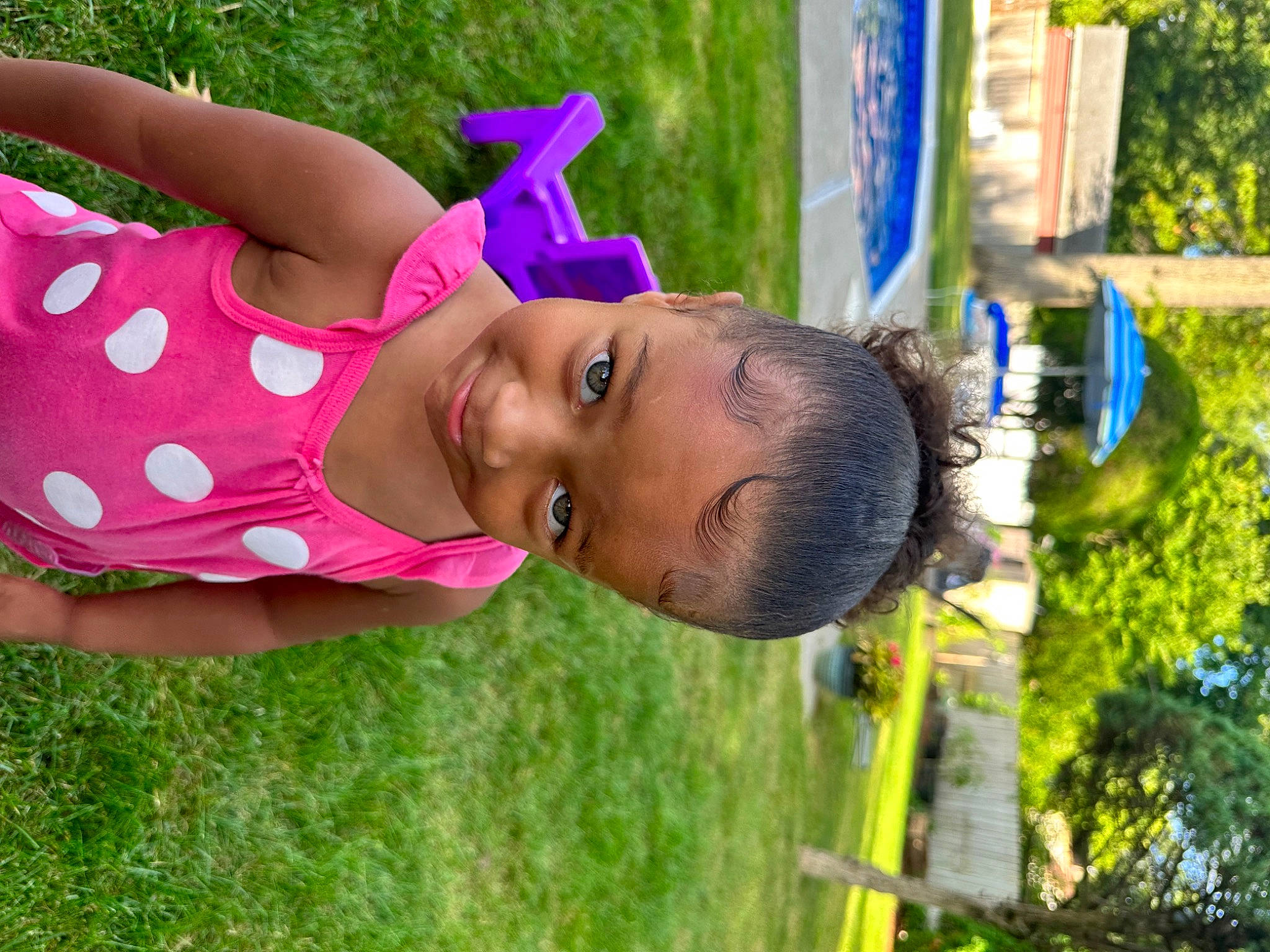 Layla is registered to the contest to win money with this photo: baby, child, fun, grass, grassland, happy, hat, joy, leisure, magenta, people_in_nature, person, plant, play, recreation, smile, t_shirt, toddler, tree, vacation