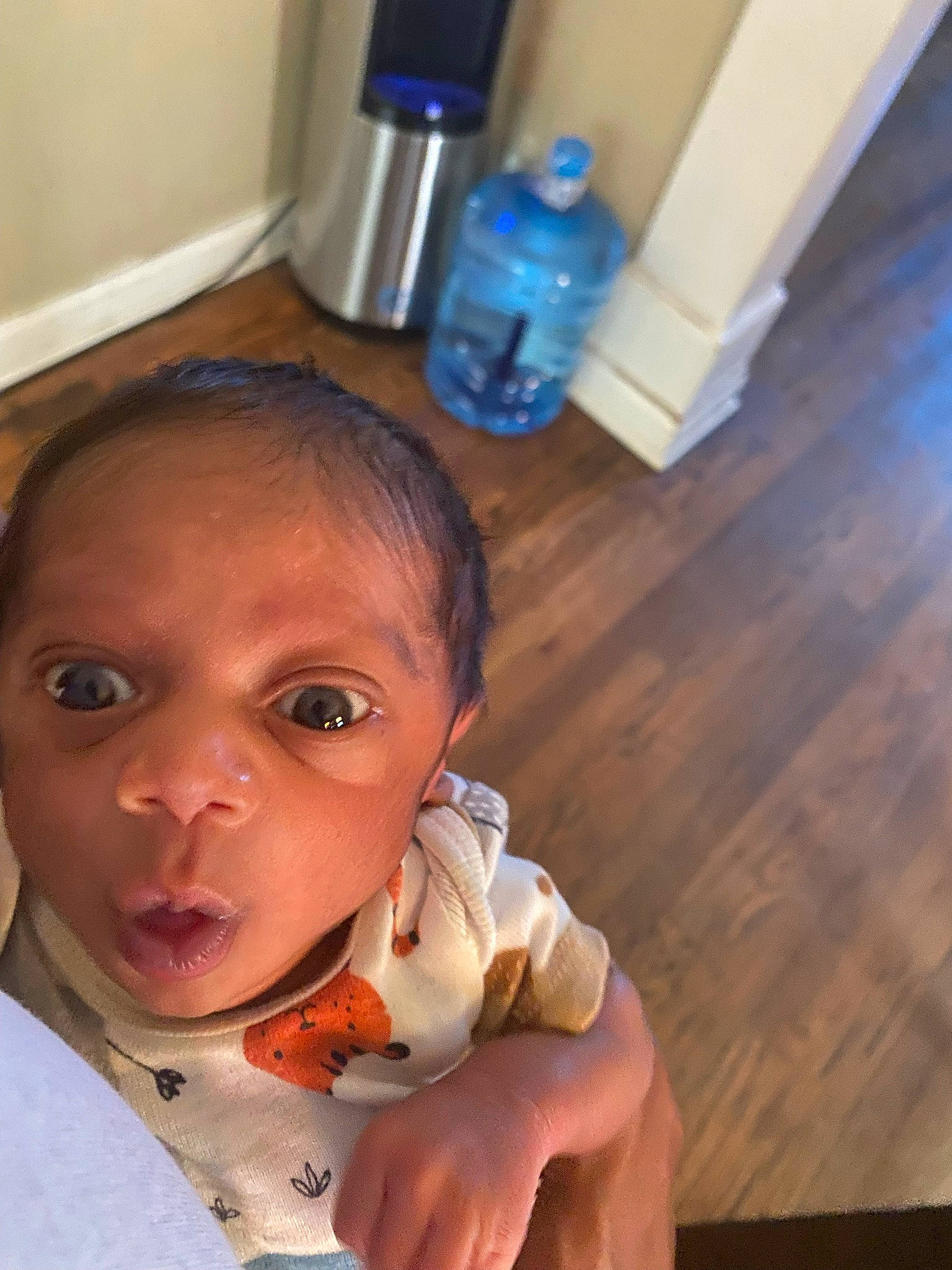 Camdyn is registered to the contest to win money with this photo: baby, blue, cheek, ear, eye, eyebrow, eyelash, finger, gesture, hand, iris, jaw, lip, mouth, neck, nose, person, plastic_bottle, skin, sleeve