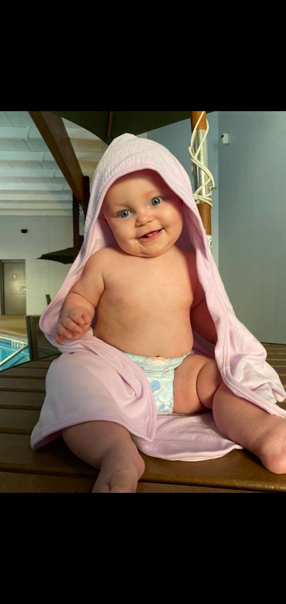 Amelia is registered to the contest to win money with this photo: abdomen, baby, baby_products, baby_toddler_clothing, cap, chest, diaper, face, foot, happy, headwear, human_body, human_leg, joy, knee, leisure, magenta, person, shorts, smile