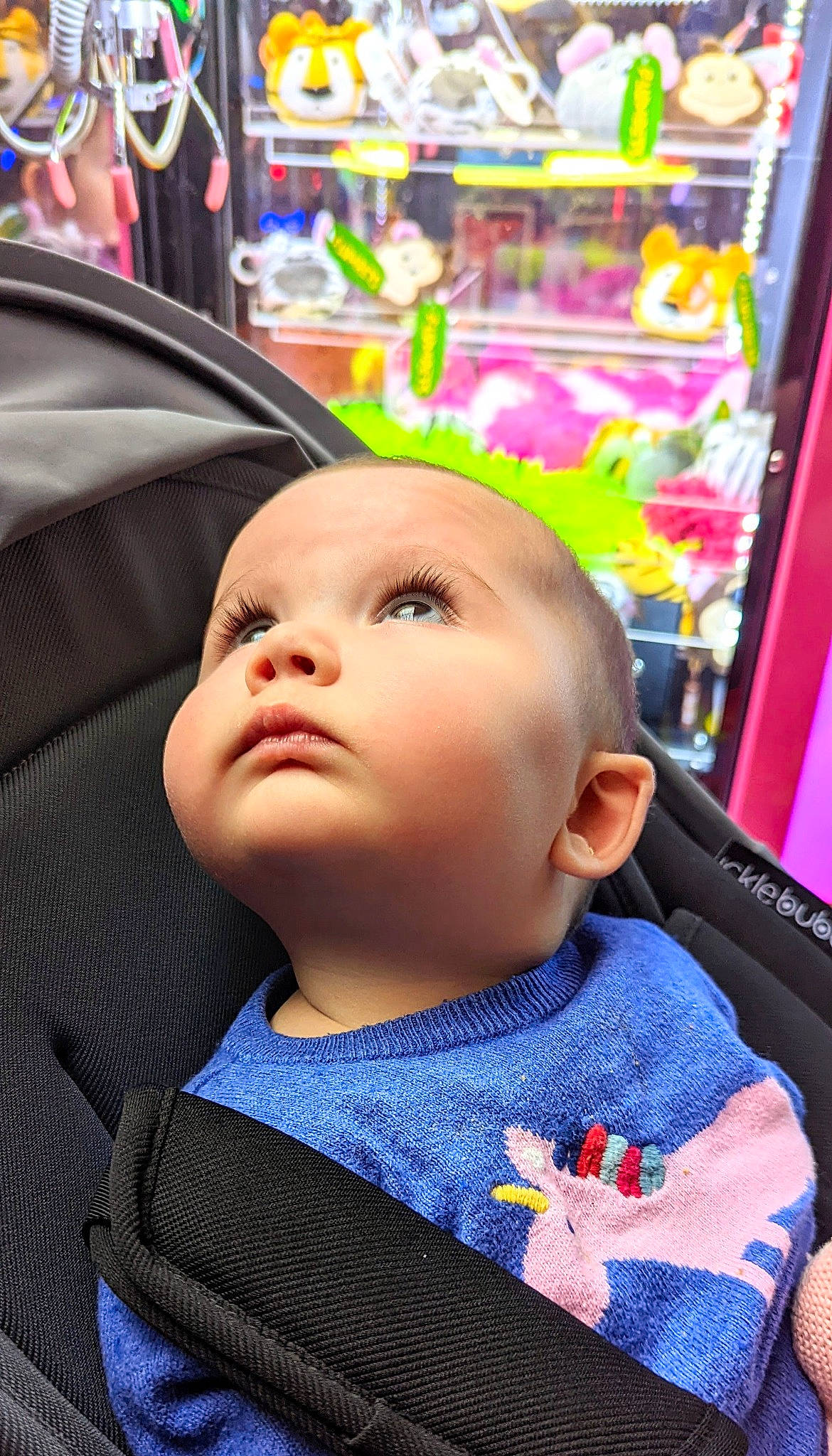Georgie is registered to the contest to win money with this photo: baby, baby_carriage, baby_products, baby_toddler_clothing, beauty, car_seat, cheek, child, electric_blue, event, eyelash, fashion_accessory, fun, hairstyle, outerwear, person, product, retail, skin, toddler