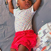 Kamouri joined the competition — help win amazing prizes! baby, sleeping, headband, polka_dot, shirt, red_shorts, bed, diapers, hairbrush, comb, toothbrush, infant, peaceful, resting, indoors, child, cute, relaxing, soft_lighting, toddler