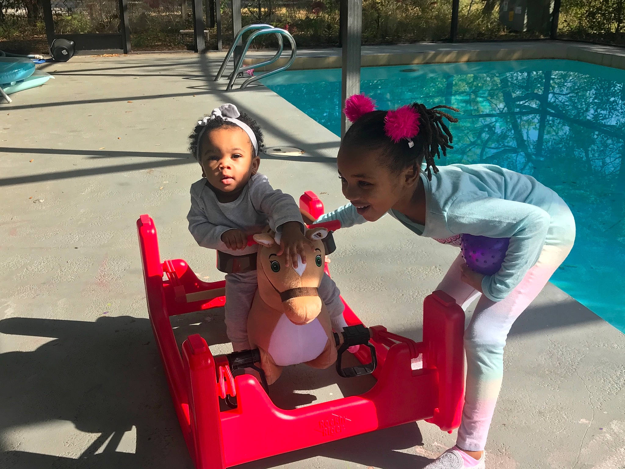 Aliyah is registered to the contest to win money with this photo: child, fun, games, leisure, person, play, recreation, toddler, vacation, vehicle