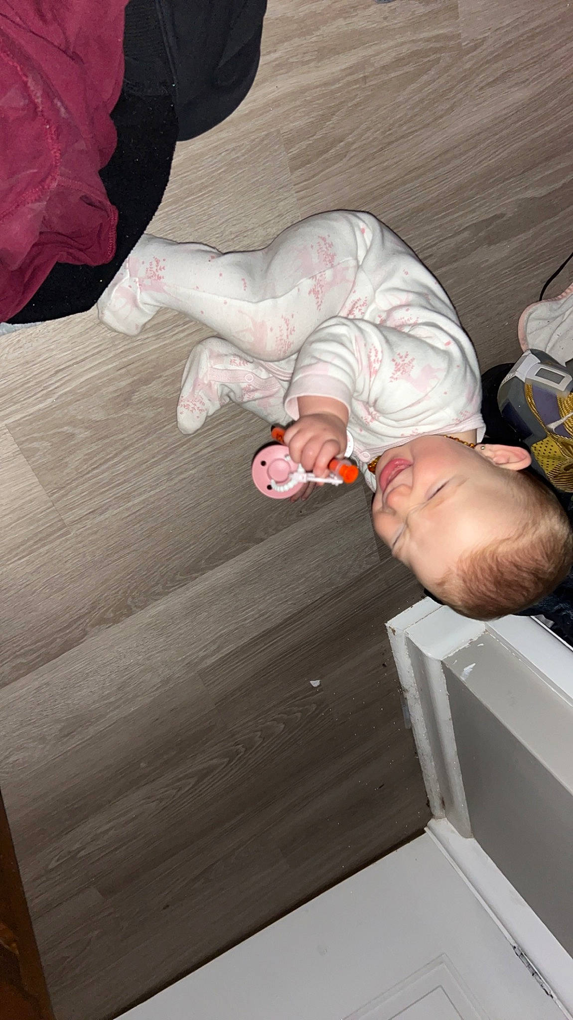 Harleigh joined the competition — help win amazing prizes! baby, baby_products, baby_toddler_clothing, child, comfort, elbow, finger, foot, gesture, hardwood, human_leg, linens, nail, nap, person, room, sitting, thumb, toddler, wood