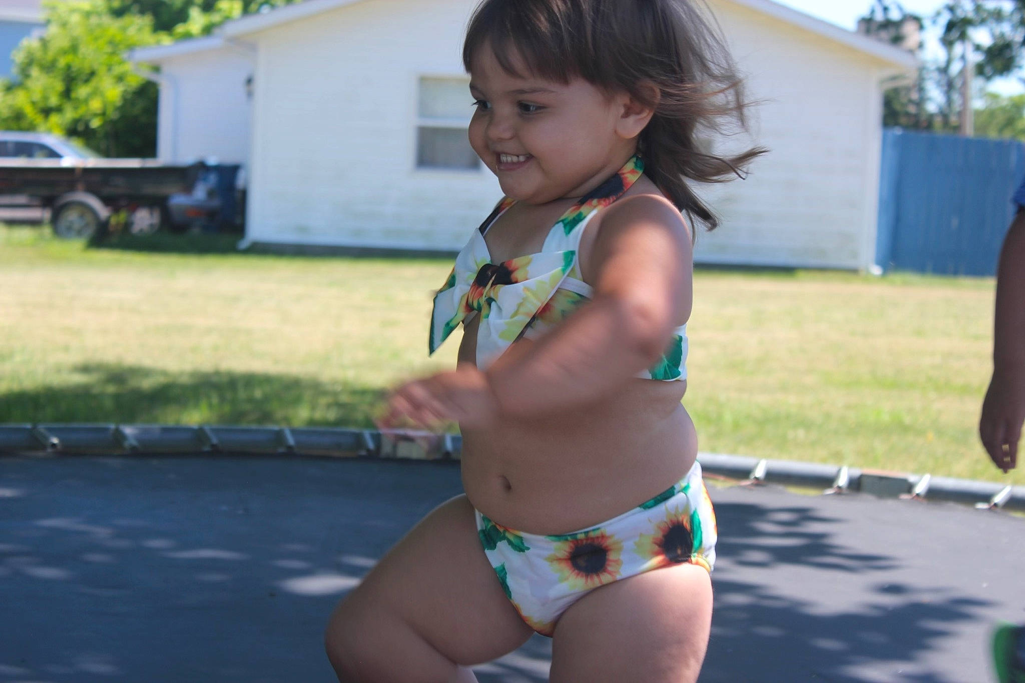 Isabella Rose is registered to the contest to win money with this photo: abdomen, brassiere, chest, eyewear, face, grass, hair, happy, joy, navel, person, plant, smile, summer, swimwear, thigh, toddler, trunk, undergarment, underpants