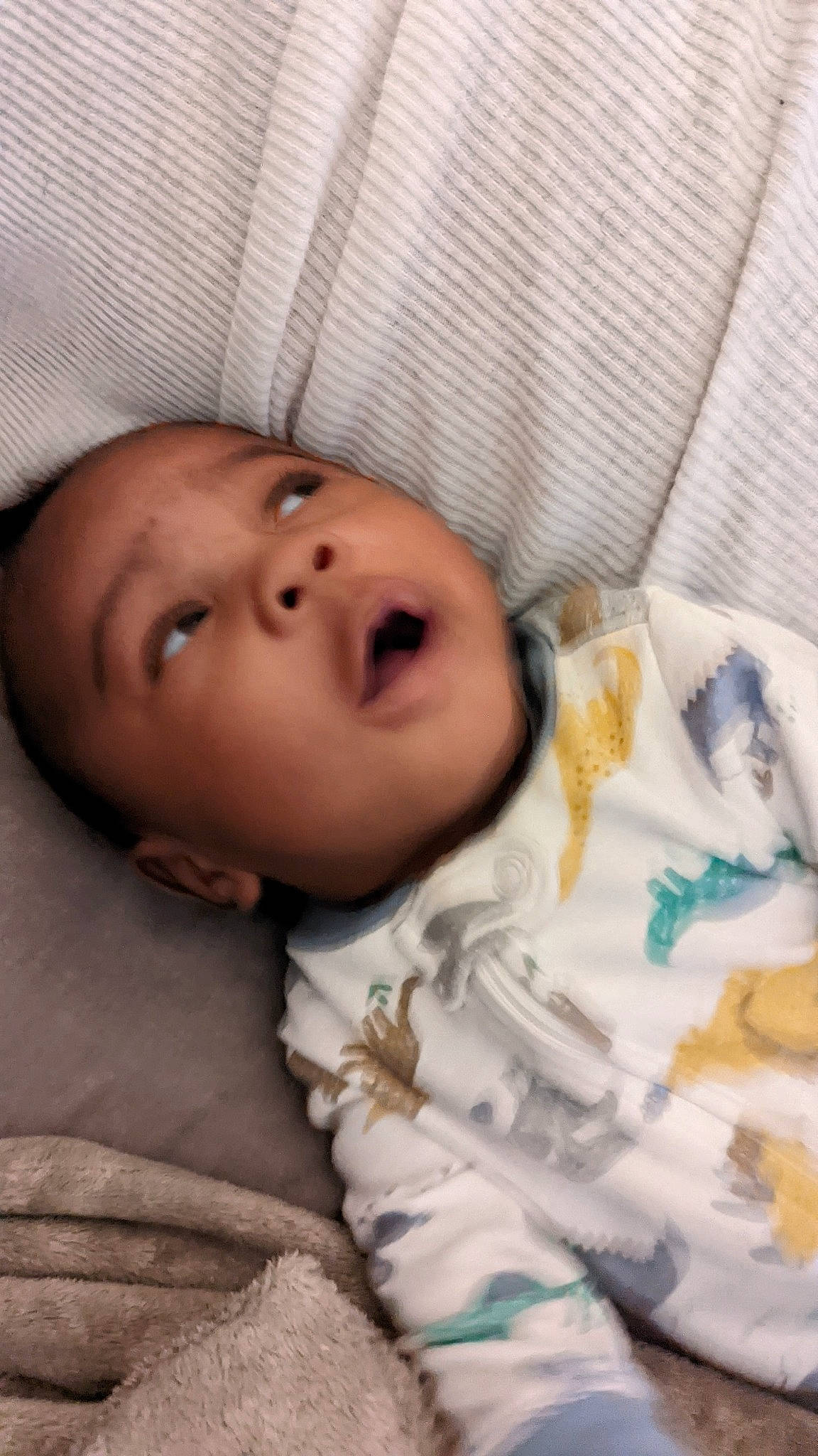 Kymani is registered to the contest to win money with this photo: baby, baby_toddler_clothing, cheek, child, chin, comfort, eye, eyebrow, eyelash, facial_expression, human_body, iris, linens, lip, mouth, nose, person, skin, sleeve, textile