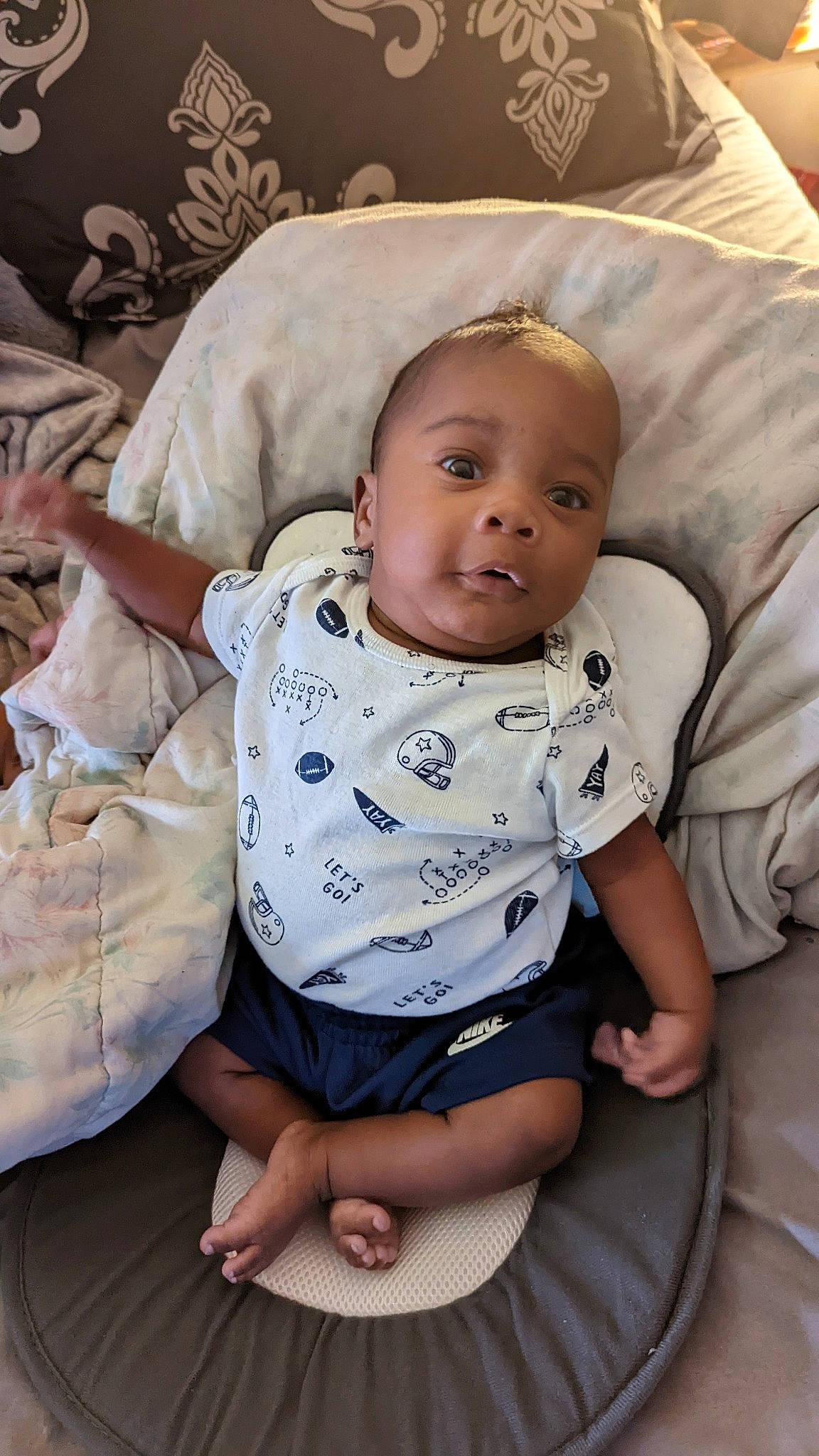 Kymani is registered to the contest to win money with this photo: baby, baby_products, baby_toddler_clothing, cheek, child, chin, comfort, eye, happy, head, human_body, iris, lip, mouth, nose, person, product, sitting, skin, sleeve