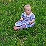 child, baby, toddler, grass, meadow, dress, purple_tights, barefoot, sitting, outdoor, dandelion, clover, greenery, portrait, candid, cute, playful, nature, field, one_person