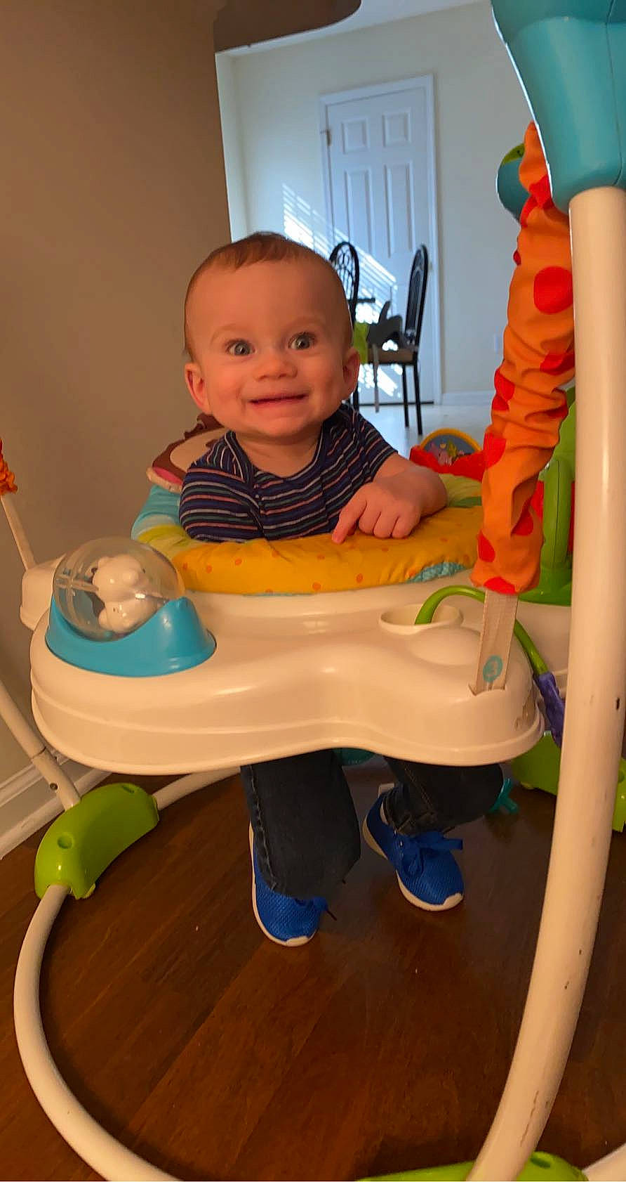 Marcel is registered to the contest to win money with this photo: baby, baby_grabbing_for_something, baby_laughing, baby_products, baby_toddler_clothing, baby_toys, child, joy, person, plastic, product, sitting, toddler