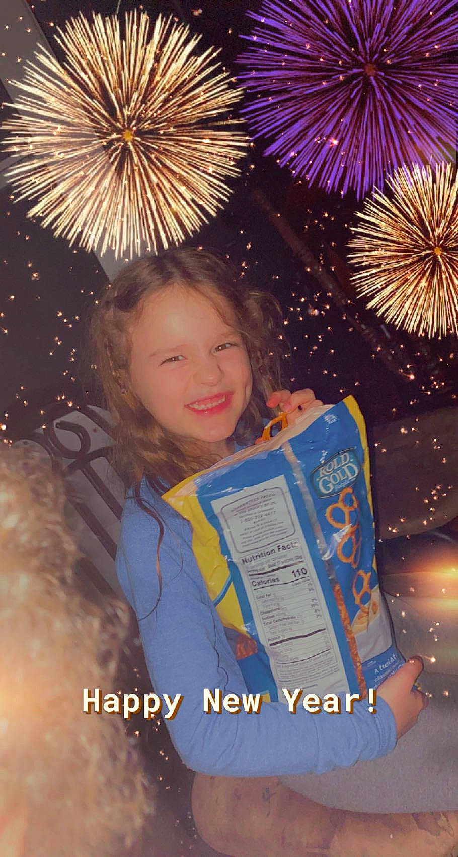 Azlynn is registered to the contest to win money with this photo: brown_hair, celebrating, ceremony, electric_blue, event, facial_expression, festival, fete, fireworks, happy, holiday, human, iris, joy, midnight, new_year, new_years_eve, person, purple, space