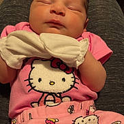 Cazlynn joined the competition — help win amazing prizes! newborn, baby, sleeping, infant, portrait, indoors, pink_clothing, hello_kitty, bow, blanket, sitting, lap, chair, cozy, cute, peaceful, face, closed_eyes, family_photo, casual_snapshot