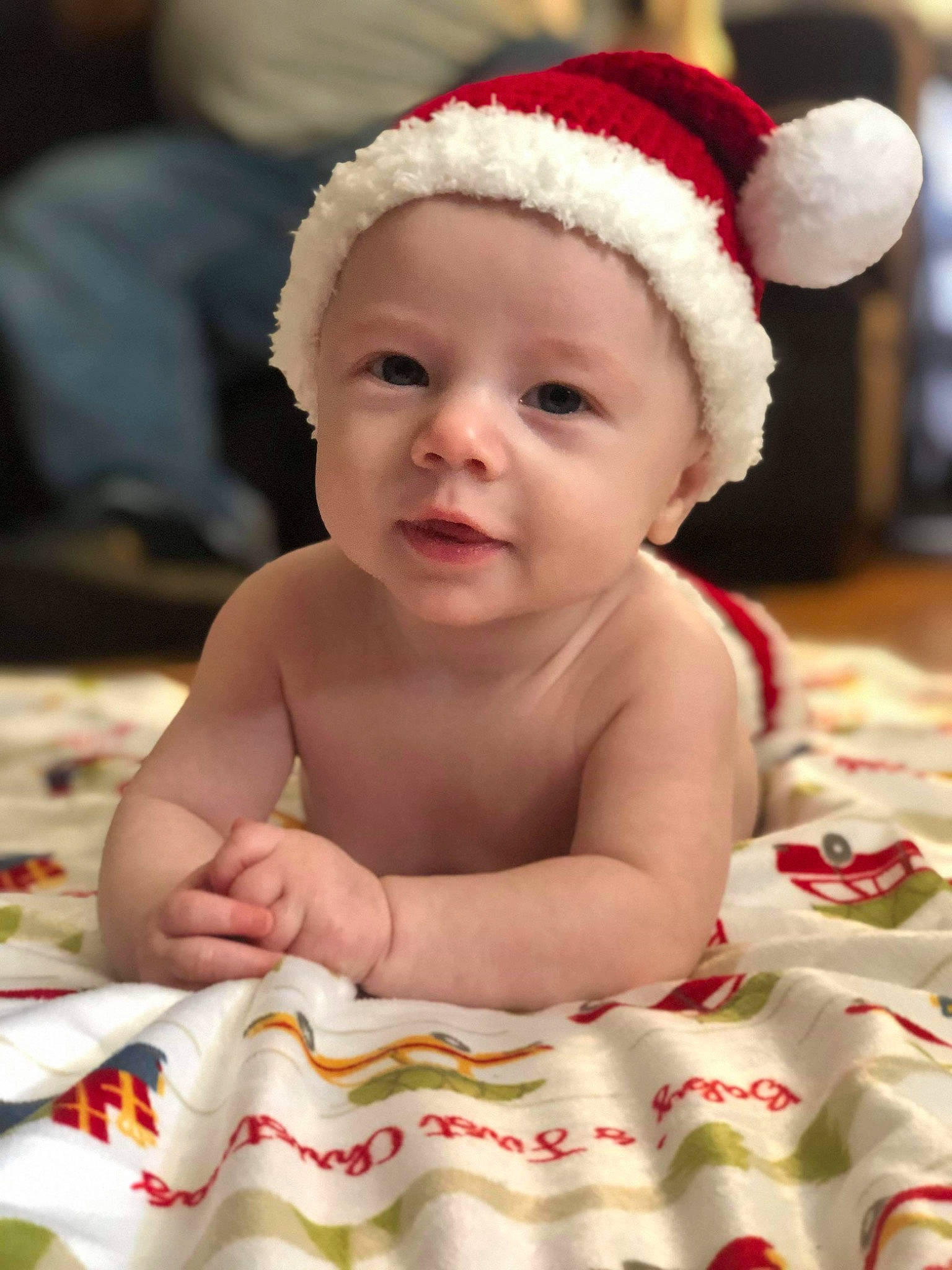 Rick is registered to the contest to win money with this photo: baby, cheek, child, christmas, christmas_eve, face, fictional_character, head, headgear, headwear, holiday, person, skin, smile, toddler