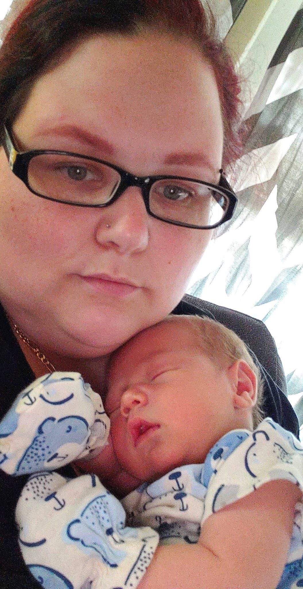 Rick is registered to the contest to win money with this photo: baby, bedtime, birth, child, childbirth, glasses, headwear, nose, person, selfie, sleep, toddler