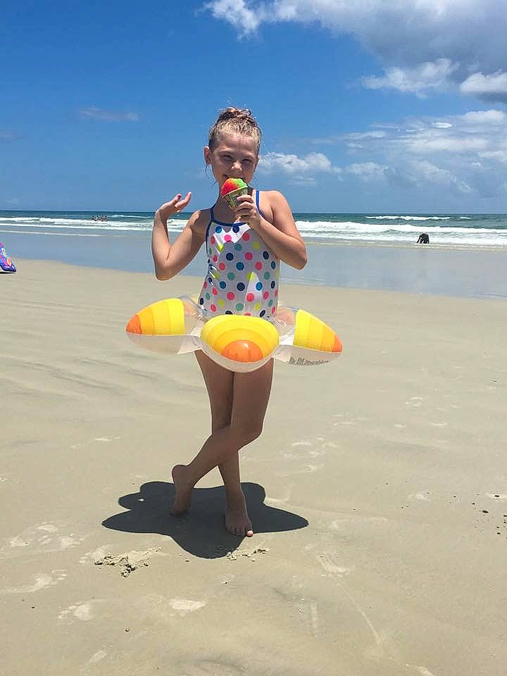 Alexis is registered to the contest to win money with this photo: beach, coast, fun, happy, headwear, joy, person, recreation, sand, sea, summer, thigh, tourism, vacation