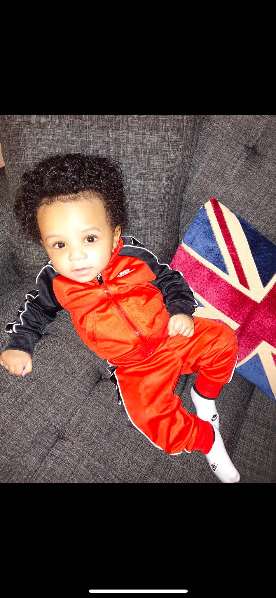 Donald joined the competition — help win amazing prizes! baby, baby_toddler_clothing, carmine, cheek, child, comfort, flash_photography, flooring, fun, fur, gesture, happy, jacket, nose, person, portrait_photography, room, sitting, sleeve, textile