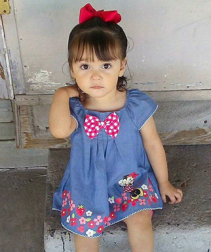 Isabela joined the competition — help win amazing prizes! baby_toddler_clothing, beauty, child, day_dress, dress, electric_blue, eyelash, hair, happy, head, iris, lip, neck, one_piece_garment, pattern, person, pink, skin, sleeve, standing