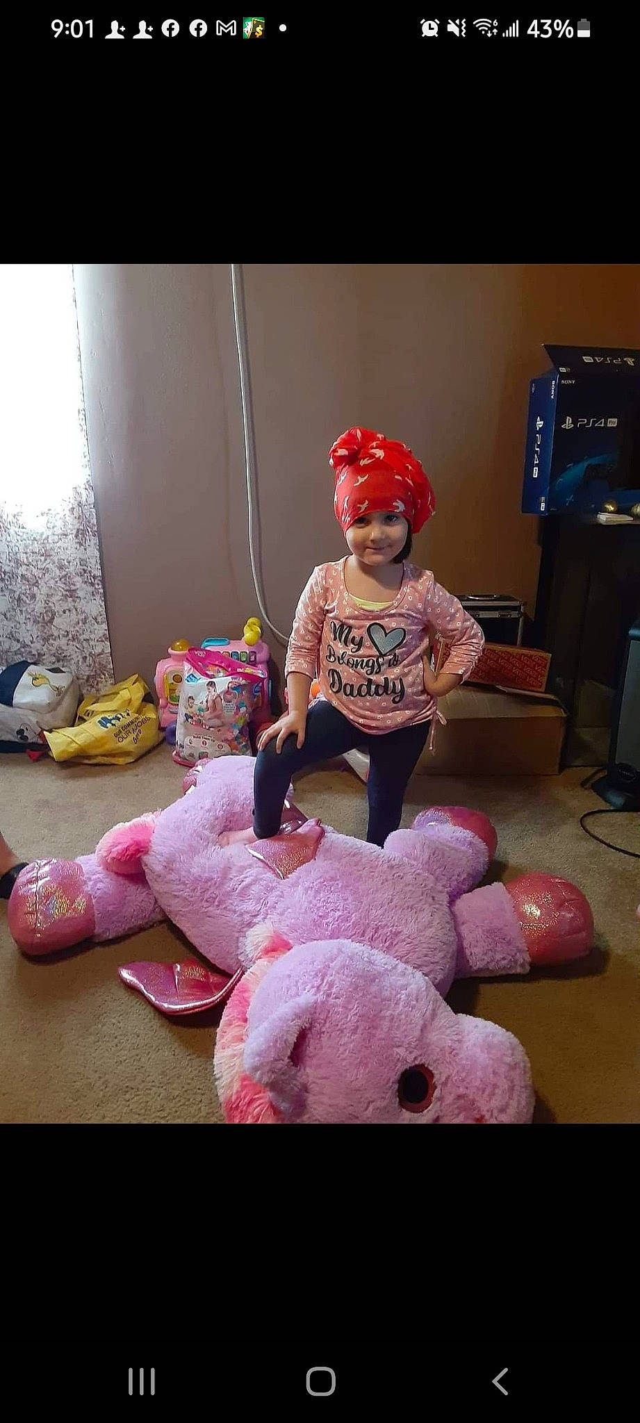 Isabela joined the competition — help win amazing prizes! baby, baby_toddler_clothing, cap, carmine, child, flooring, fun, hat, headwear, joy, magenta, person, pink, play, plush, room, sitting, smile, stuffed_toy, suidae
