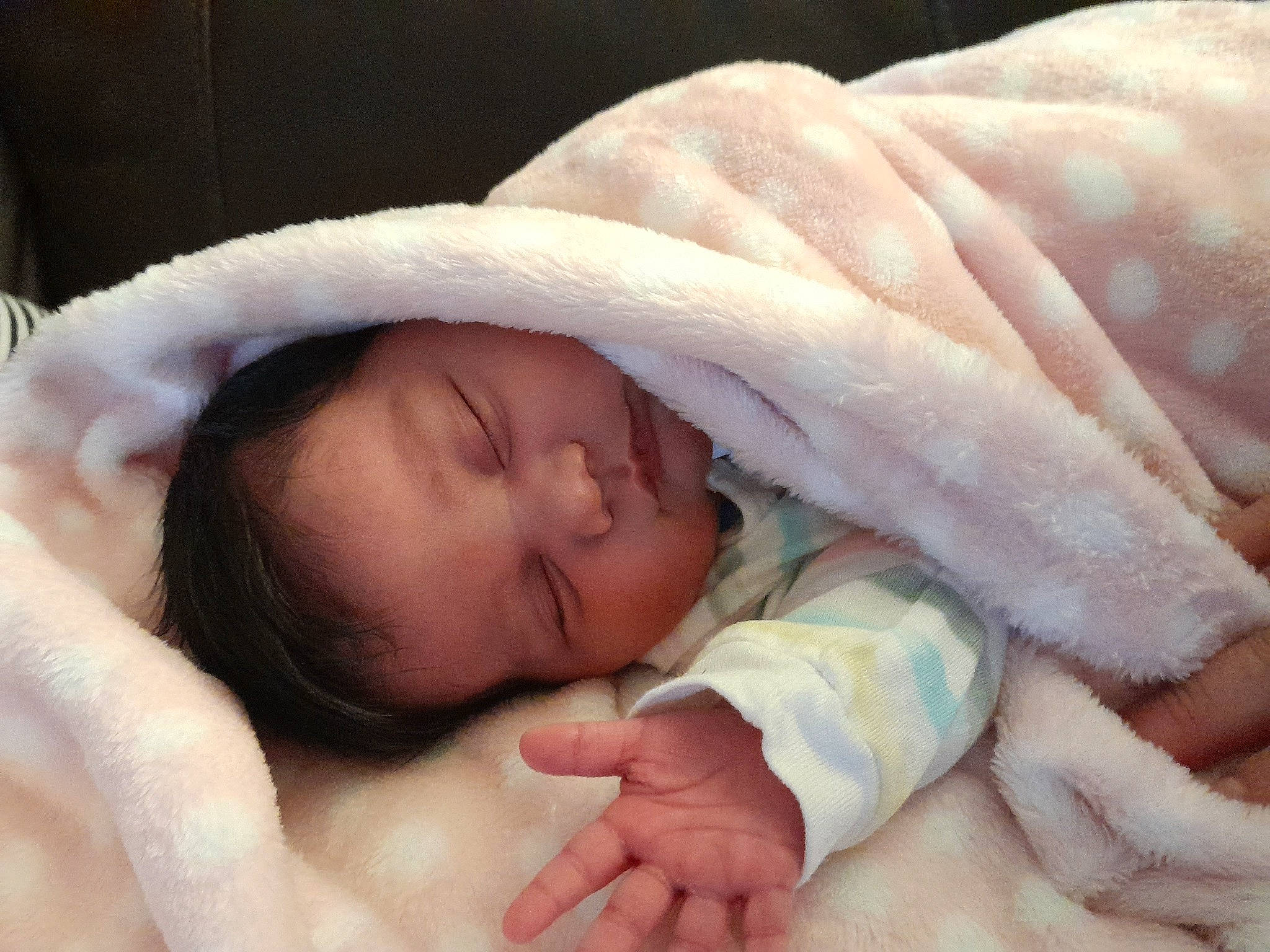 Melody is registered to the contest to win money with this photo: baby, cheek, child, comfort, ear, eye, eyebrow, face, finger, gesture, hand, head, human_body, linens, lip, mouth, nose, person, skin, thumb