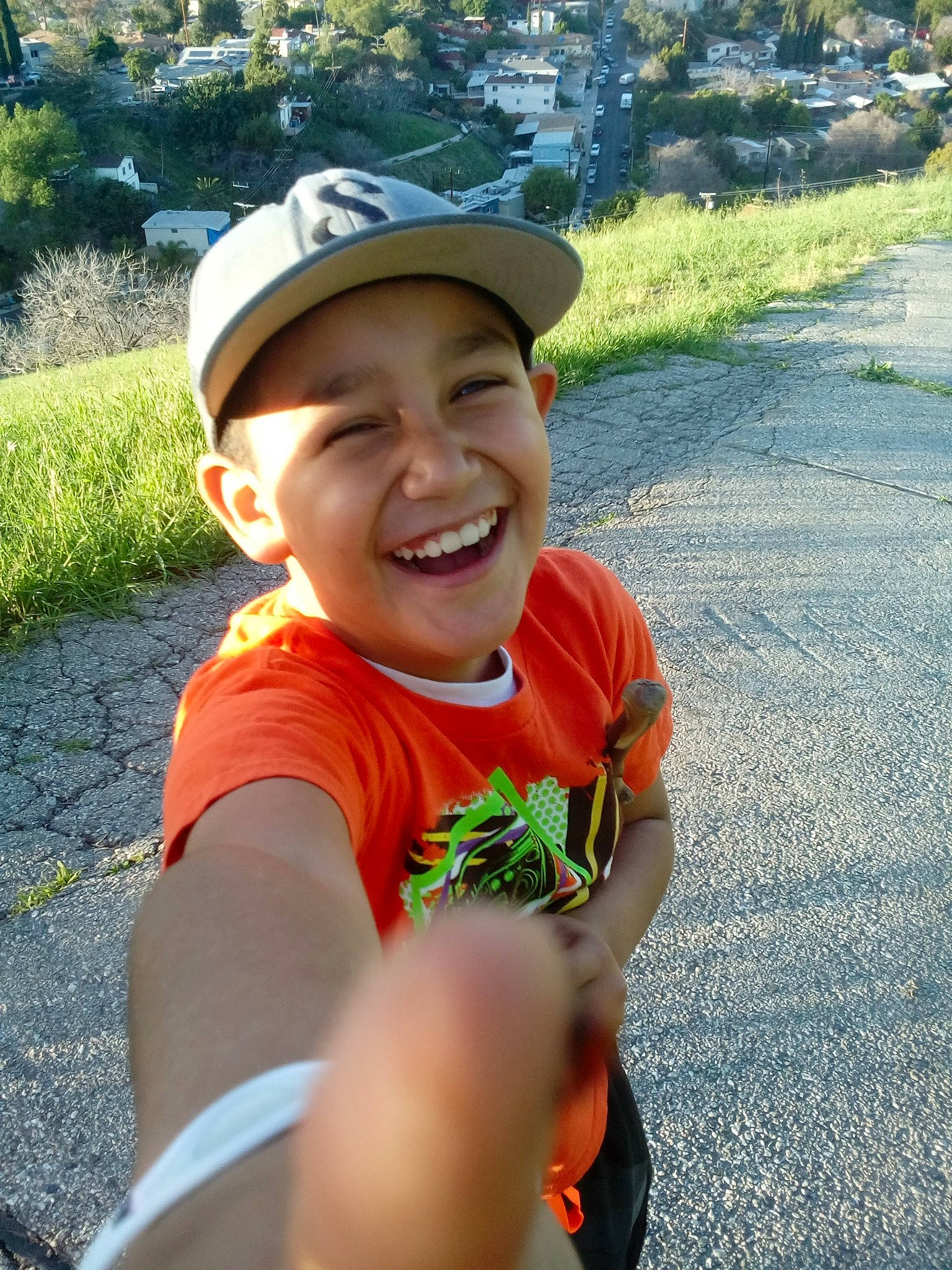 Angel is registered to the contest to win money with this photo: asphalt, baseball_cap, cap, electric_blue, eye, fun, grass, happy, hat, headgear, headwear, joy, leaf, leisure, person, personal_protective_equipment, plant, recreation, smile, sun_hat