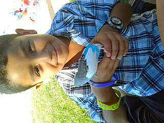 Angel joined the competition — help win amazing prizes! chest, child, elbow, eyewear, finger, fun, gesture, hand, happy, jaw, joy, leisure, mouth, nail, pattern, person, plaid, smile, tartan, thumb