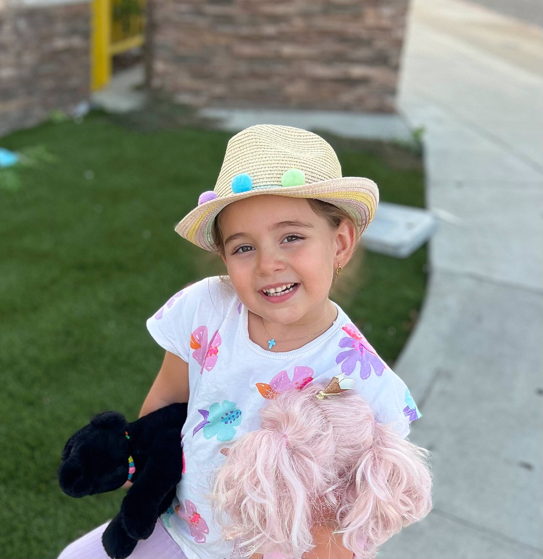 Angelina joined the competition — help win amazing prizes! baby_toddler_clothing, clothing, dress, event, face, fashion_accessory, fun, grass, happy, hat, head, headgear, headwear, joy, leisure, mammal, party_supply, person, pink, smile