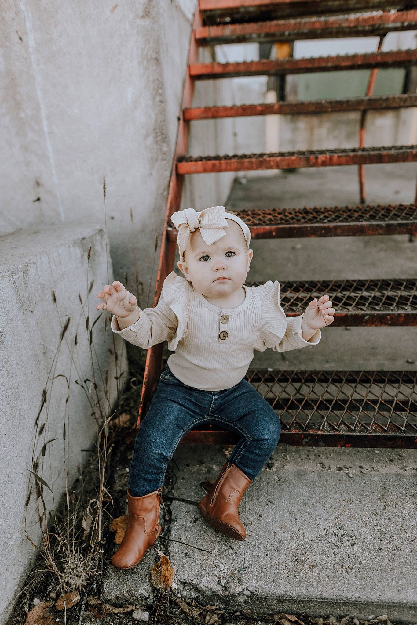 Kimber joined the competition — help win amazing prizes! baby, brick, brickwork, child, concrete, doll, door, eye, figurine, fun, happy, metal, person, sitting, soil, stuffed_toy, toddler, toy, wood