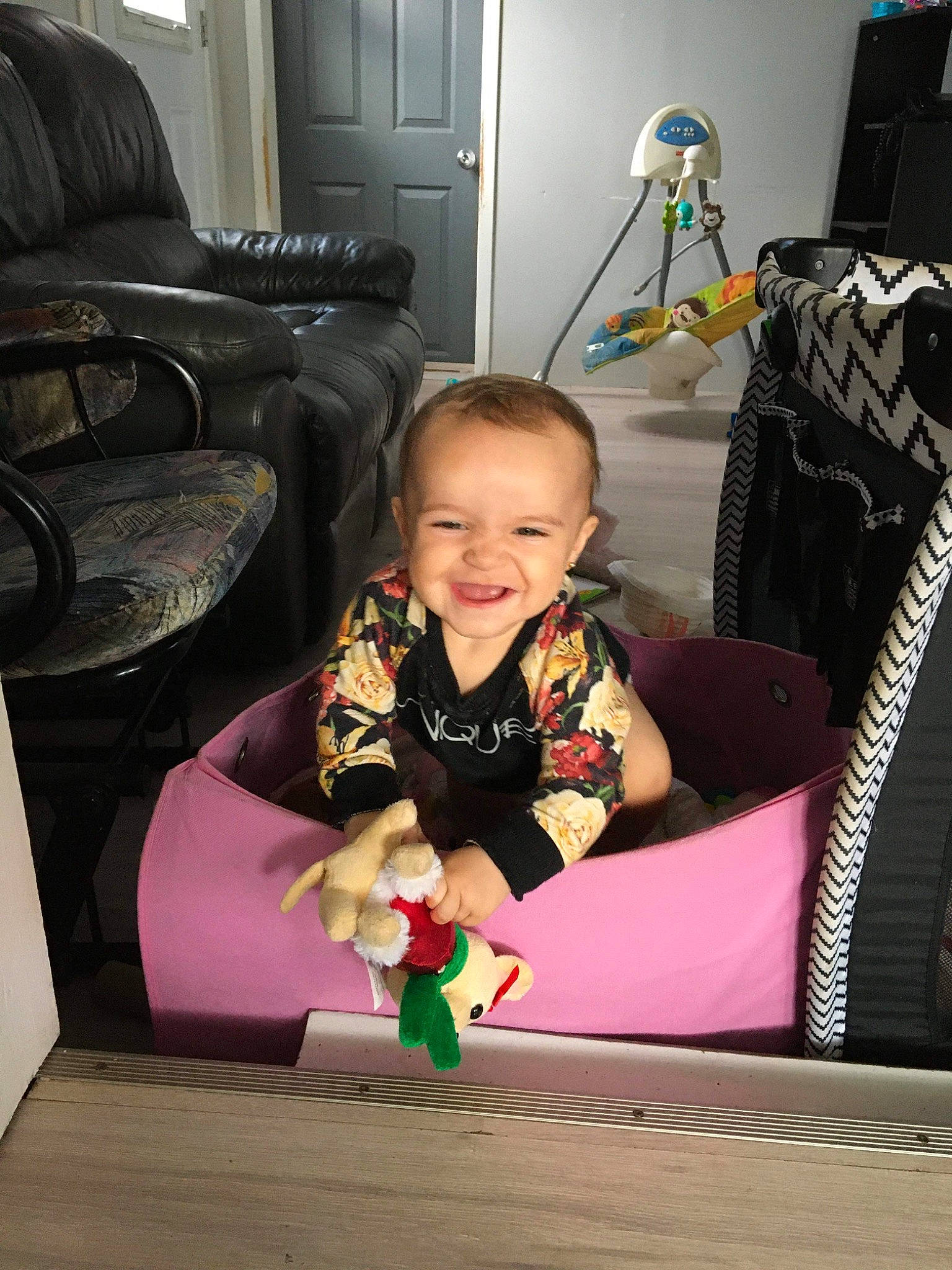 Malia is registered to the contest to win money with this photo: automotive_tire, baby, chair, child, comfort, couch, crawling, event, flooring, formal_wear, fun, happy, joy, person, play, recreation, room, sitting, smile, tire