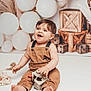 Aaron participe au concours pour gagner de l'argent avec cette photo : baby, backdrop, balloons, barefoot, beads, child, happy, indoor, neutral_colors, overalls, photography, playful, portrait, rustic, sitting, smile, studio, toddler, toy, wooden_crates