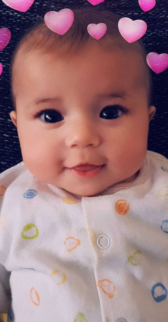 Kierra participe au concours pour gagner de l'argent avec cette photo : cheek, child, close_up, doll, eye, eyebrow, face, forehead, girl, head, human_hair_color, infant, iris, lip, mouth, nose, person, pink, skin, smile