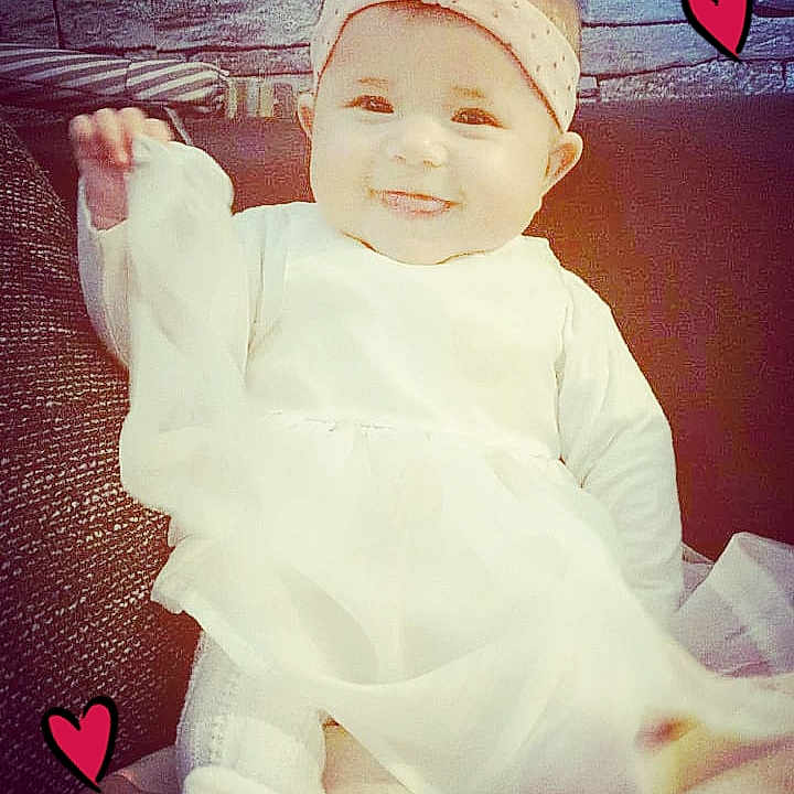 Kierra participe au concours pour gagner de l'argent avec cette photo : beauty, cheek, child, day, eye, face, girl, head, infant, joy, leg, nose, person, photograph, pink, product, skin, smile, textile, toddler