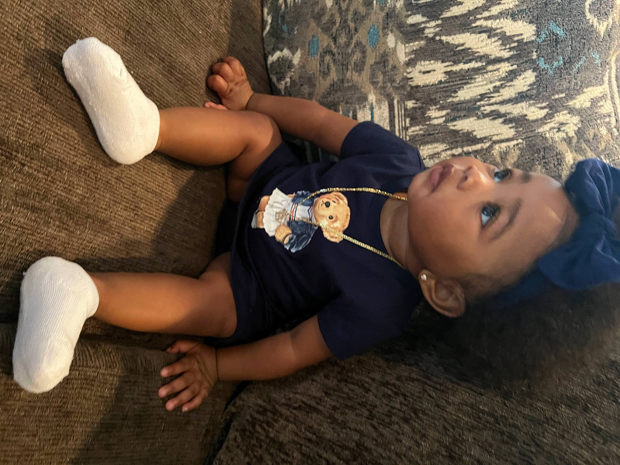 Zalaiyah is registered to the contest to win money with this photo: calf, child, comfort, elbow, eyewear, flash_photography, foot, glasses, grass, hat, human_body, human_leg, joint, knee, leg, long_hair, person, sock, sunglasses, thigh