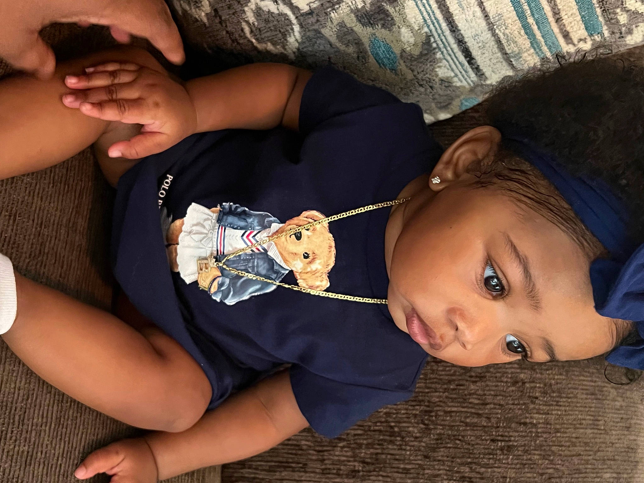 Zalaiyah is registered to the contest to win money with this photo: arm, baby_toddler_clothing, cheek, cool, elbow, eye, eyelash, finger, fun, gesture, glasses, hand, joint, mouth, neck, nose, person, skin, sleeve, toddler