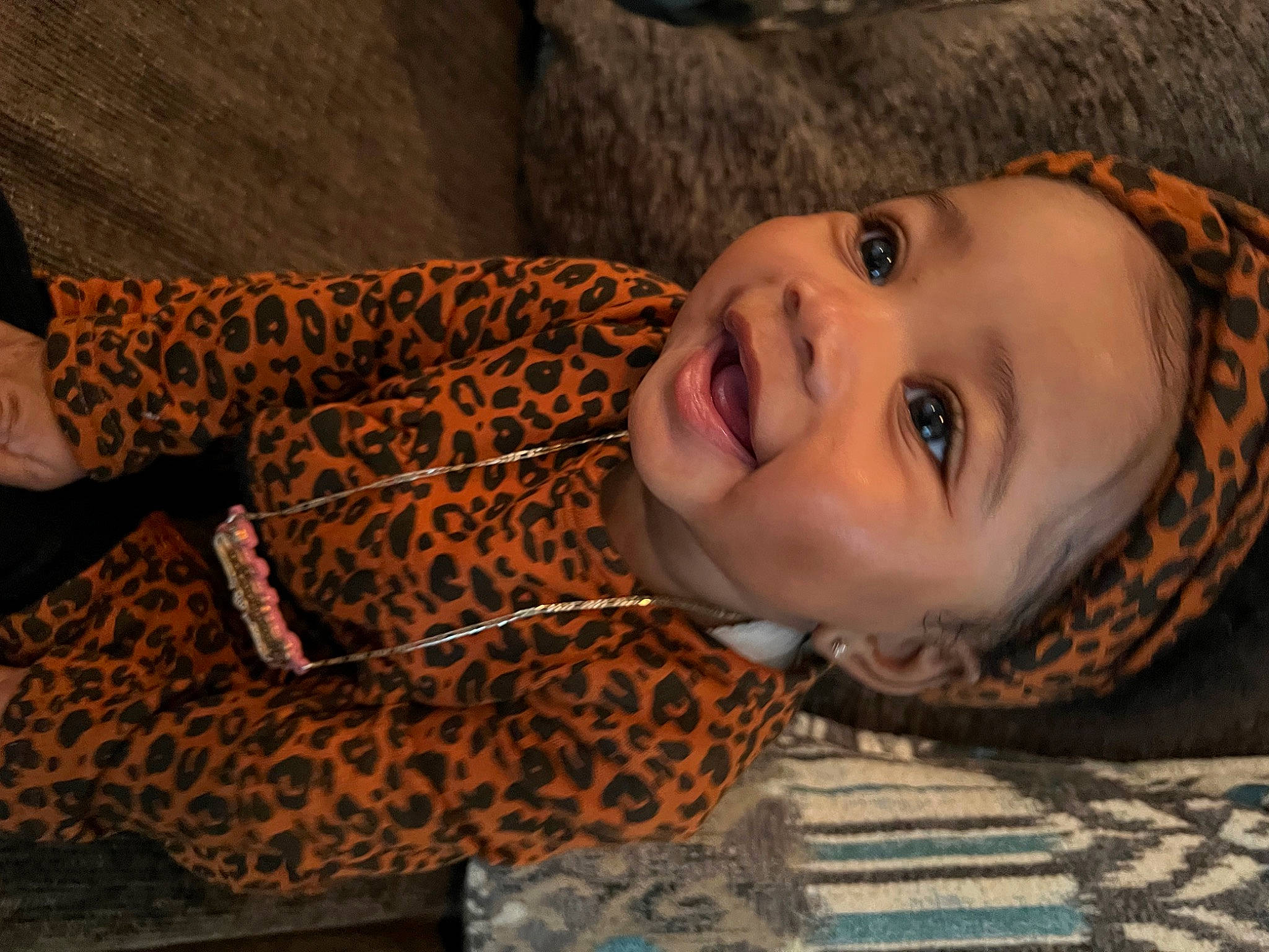 Zalaiyah is registered to the contest to win money with this photo: beauty, cheek, comfort, eye, face, flash_photography, flooring, fun, grass, happy, head, lip, nose, person, plant, skin, smile, textile, toddler, tree