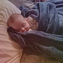 Scarlett is registered to the contest to win money with this photo: baby, sleeping, blanket, bed, pillow, cozy, soft, child, infant, peaceful, wrapped, rest, indoors, cute, portrait, head, face, comfort, warm, toddler