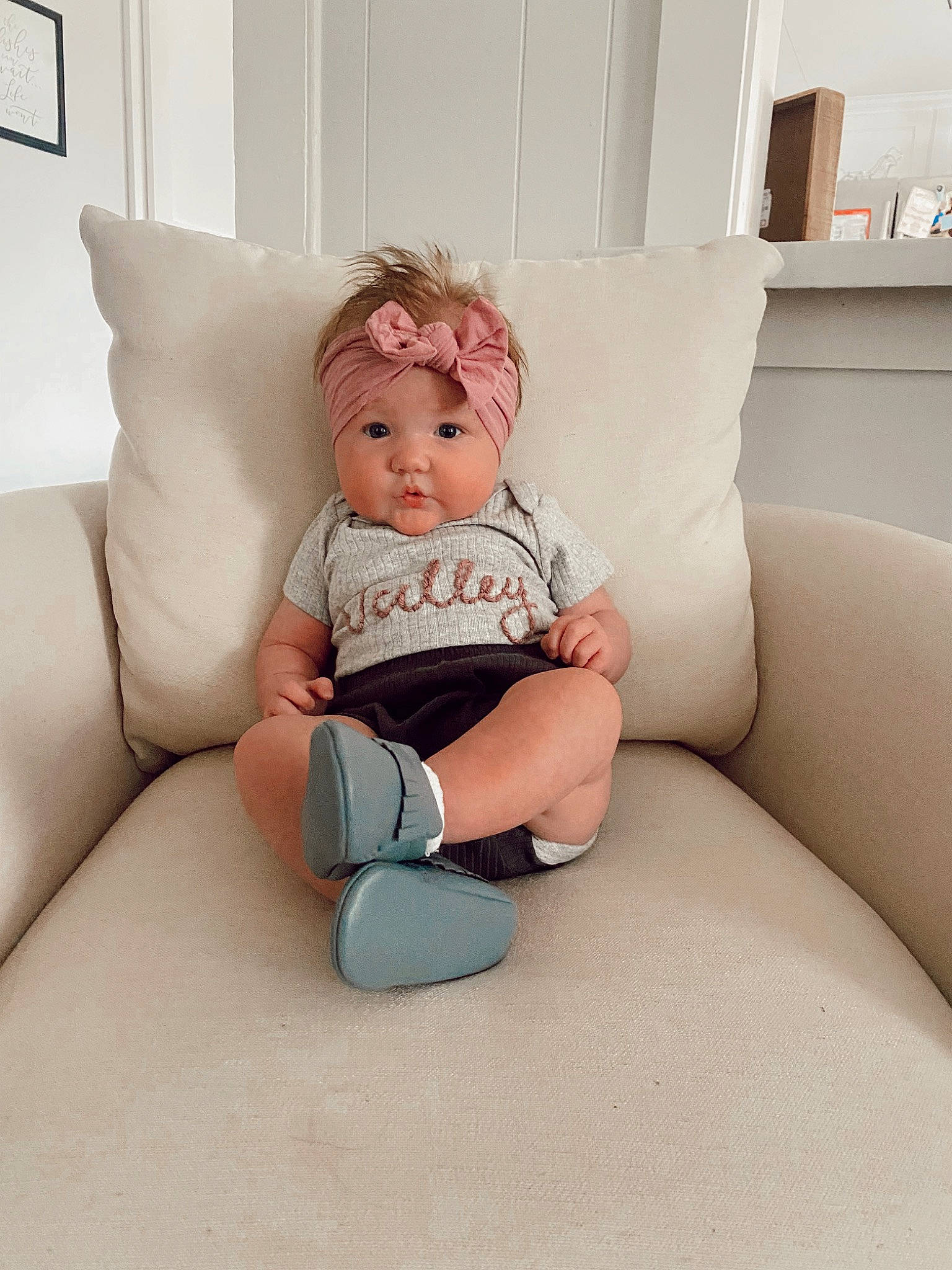 Valley joined the competition — help win amazing prizes! baby, baby_toddler_clothing, child, comfort, couch, flooring, foot, headwear, human_leg, knee, leg, living_room, person, picture_frame, sitting, sleeve, sock, t_shirt, textile, thigh