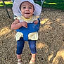 Bayley joined the competition — help win amazing prizes! toddler, child, swing, playground, sun_hat, yellow_top, polka_dot_leggings, sandals, wood_chips, outdoor, daylight, smiling, happy, park, trees, shadow, metal_chains, baby_swing, cute, summer