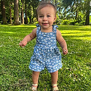 Bayley joined the competition — help win amazing prizes! toddler, child, outdoor, grass, flowers, trees, sunlight, blue_sky, romper, footwear, nature, greenery, happy, smiling, portrait, person, summer, cute, daylight, playful