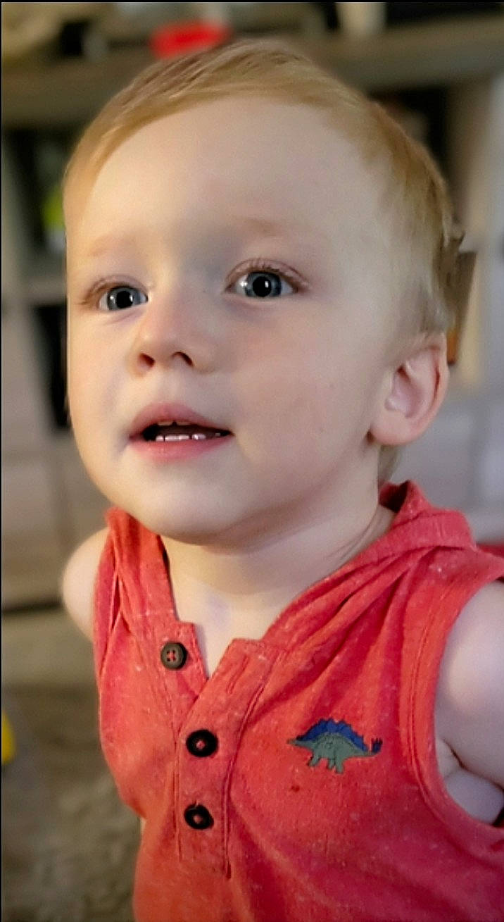 Fisher is registered to the contest to win money with this photo: baby, baby_toddler_clothing, blond, cheek, child, chin, close_up, ear, eyebrow, eyelash, fun, happy, iris, jaw, lip, mouth, nose, person, skin, sleeve